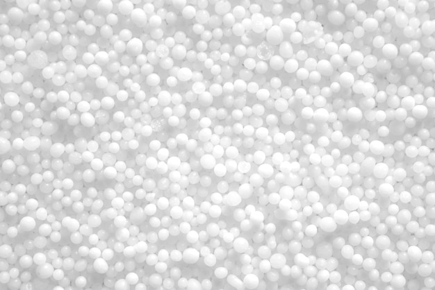 Foto de textura de salitre blanco compuesta de muchas bolas pequeñas