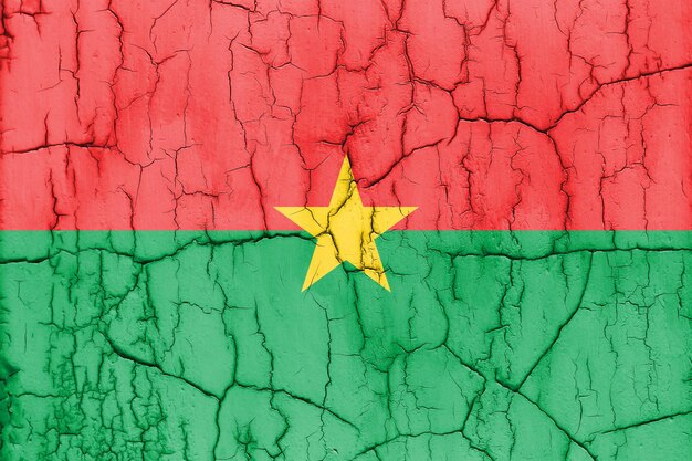 Foto foto texturizada de la bandera de burkina faso con grietas