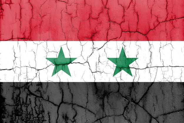 Foto texturizada de la bandera de Siria con grietas