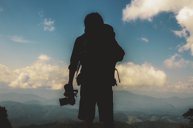 Fotograf bei Sonnenuntergang.