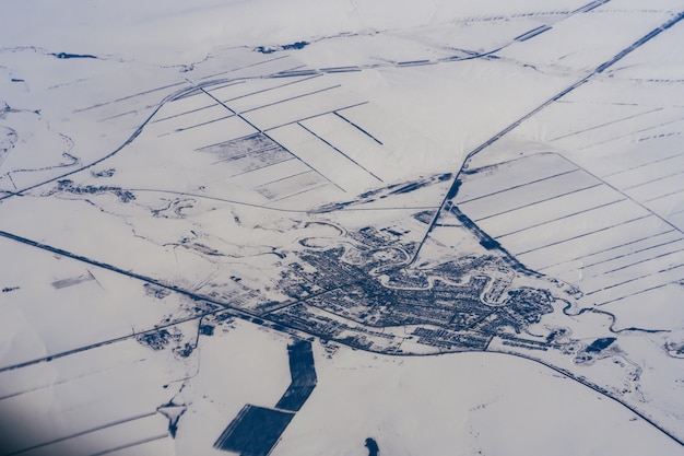 fotografia aérea da cidade na neve no inverno na Sibéria na Rússia