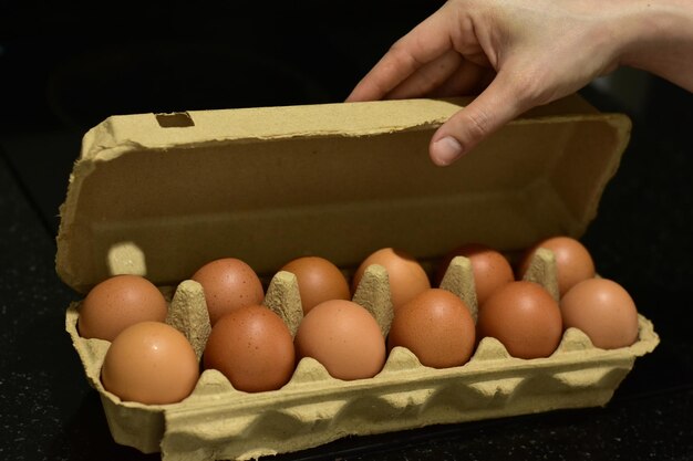 Foto fotografía de cerca mano sosteniendo comida