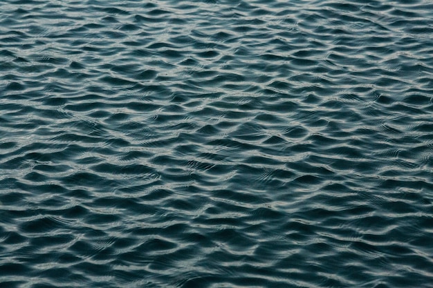 Foto fotografía completa del agua ondulada en el mar