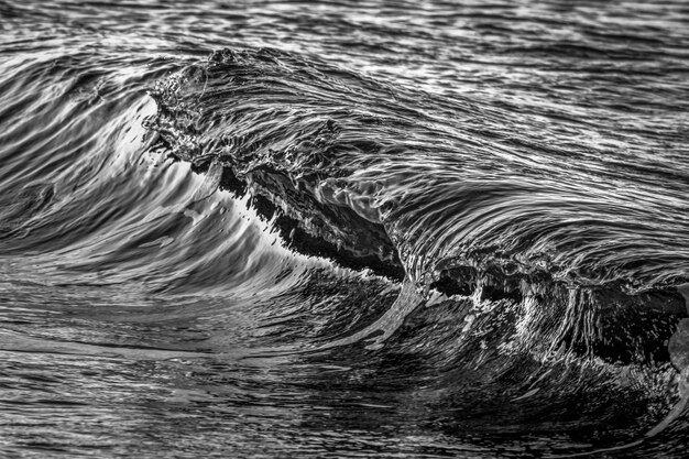 Foto fotografía completa del agua que fluye en el mar