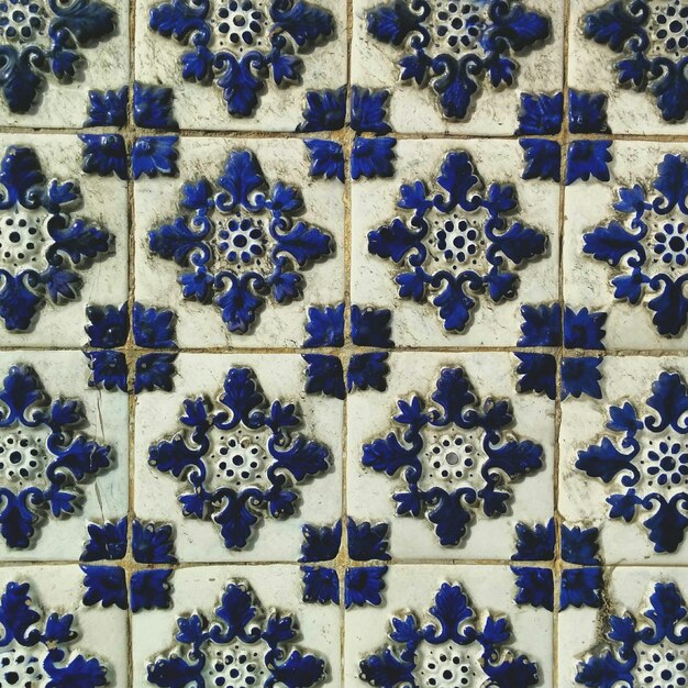 Foto fotografía completa de los azulejos de mosaico azul