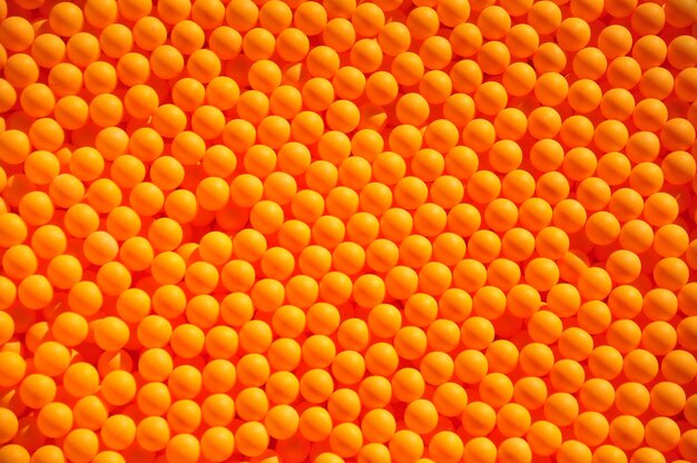 Fotografía completa de las bolas de tenis de mesa naranja