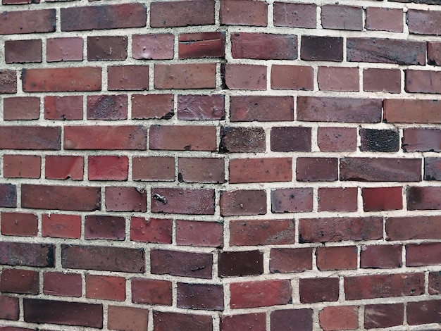 Fotografia completa da parede de tijolos vermelhos
