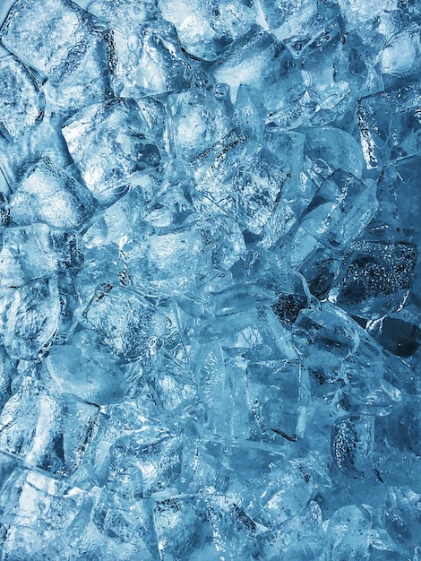 Foto fotografia completa de cubos de gelo derretendo
