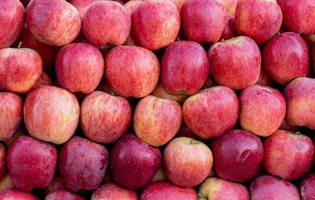 Foto fotografia completa de maçãs vermelhas, maçãs vermellas frescas da aldeia.