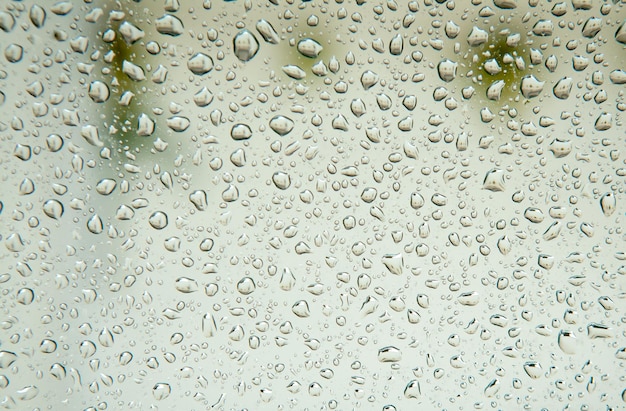 Foto fotografía completa de las gotas de lluvia en una ventana de vidrio