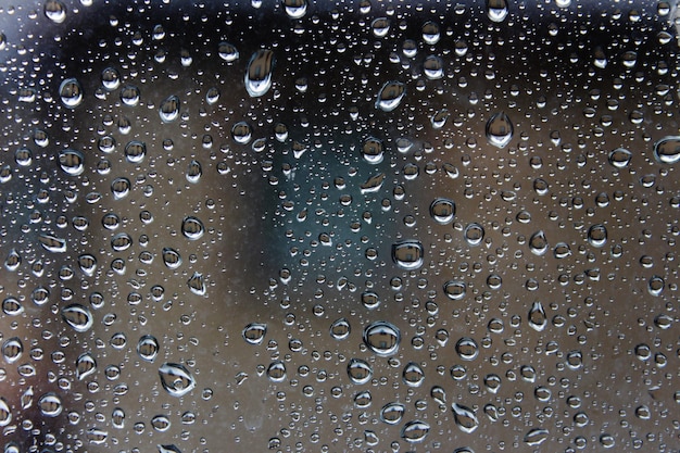 Foto fotografía completa de las gotas de lluvia en el vidrio