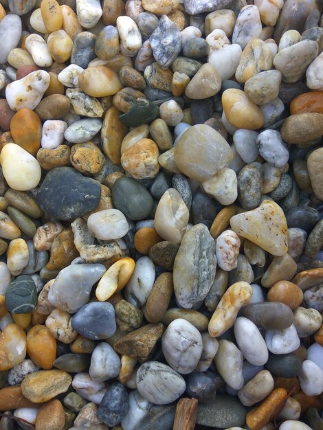 Foto fotografía completa de piedras en la playa