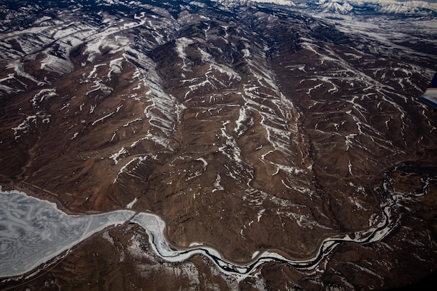 Foto fotografía completa de la tierra cubierta de nieve