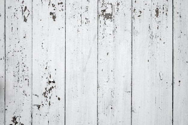 Fotografía completa de una valla de madera desgastada por el tiempo