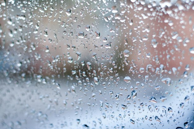 Foto fotografía completa de una ventana de vidrio húmedo durante la temporada de lluvias