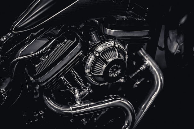 Foto fotografia de arte de tubos de escape de motor de motor de motocicleta em tom vintage preto e branco