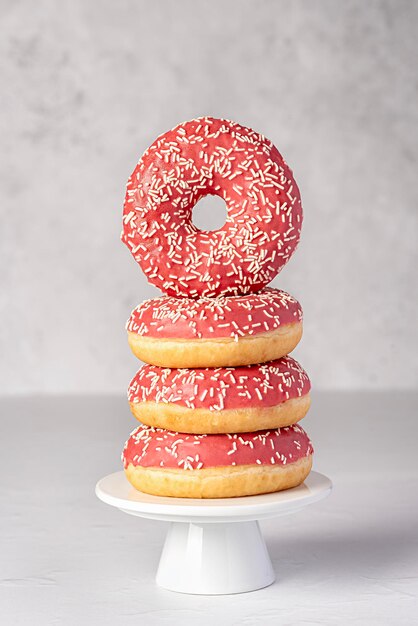 Fotografia de donuts de vidro rosa