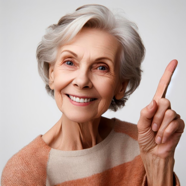 fotografia de retrato de uma velha feliz apontando contra um fundo branco ai generativo