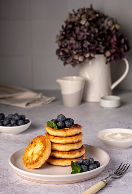 Fotografía gastronómica de tortitas con arándanos