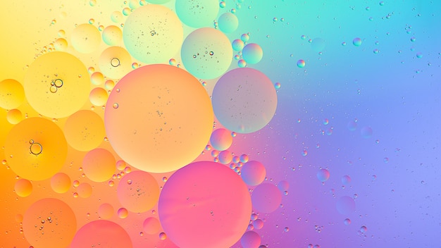 Foto fotografía macro de aceite en agua de fondo degradado colorido abstracto
