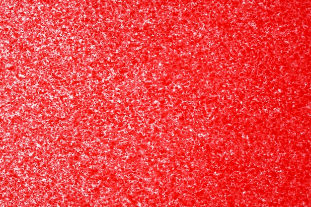 Foto fotografía macro de pintura roja en spray en papel blanco