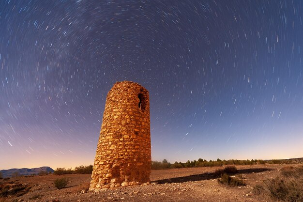 Foto fotografía nocturna, circumpolar de estrellas - cielo estrellado.