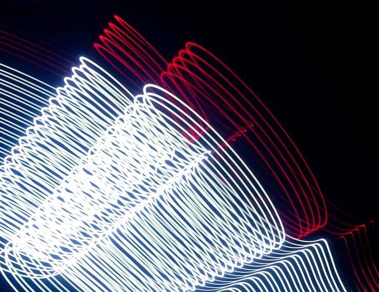 Foto fotografía de pintura con luz de larga exposición fondo abstracto líneas curvas de neón metálico vibrante