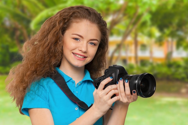 Fotógrafo de mulher com câmera