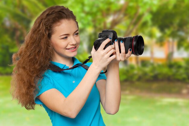 Fotógrafo de mulher com câmera