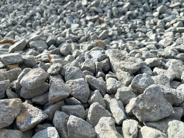 Fotohintergrundsteine, Schutt und Mauer. Die Textur der Steine ist grau und weiß