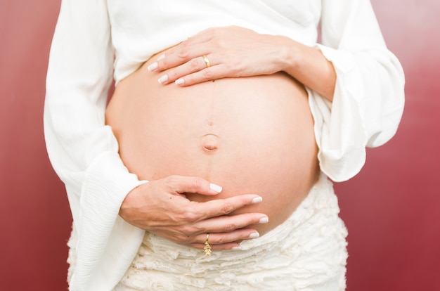 Fotoshooting der schwangeren Frau