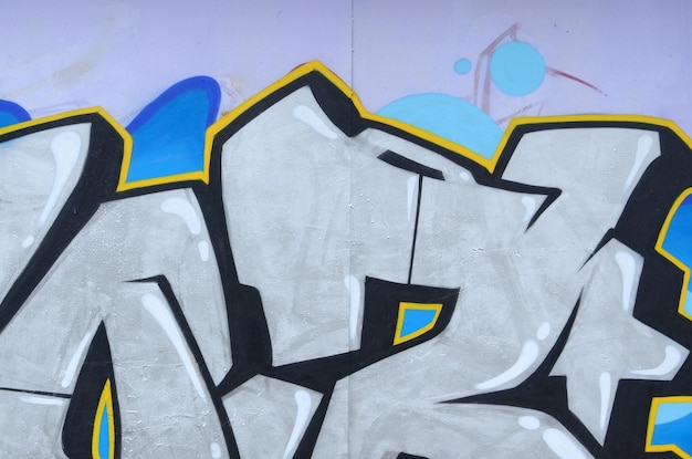 Fragment von farbigen Straßenkunst-Graffitimalereien mit Konturen und nahem hohem der Schattierung