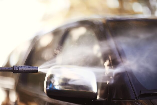 fragmento de lavagem / limpeza de carros na lavagem de carros, plano de fundo