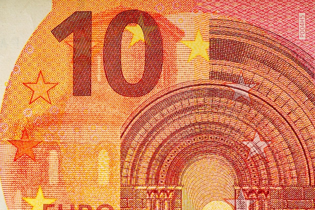 Fragmento de nota de dez euros Nota de 10 euros O euro é a moeda oficial da União Europeia