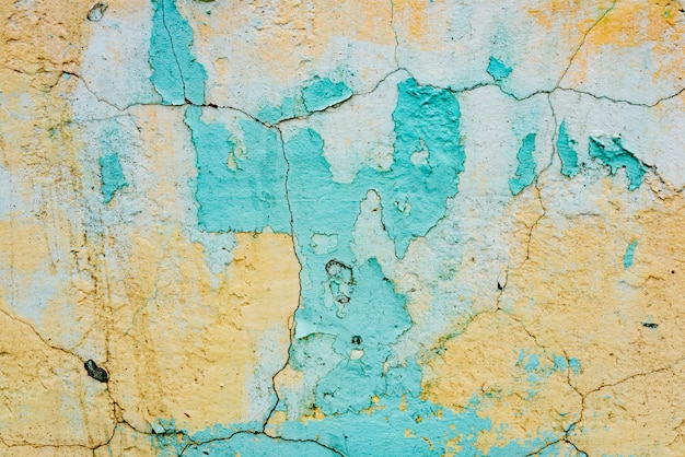 Fragmento de parede com arranhões e rachaduras