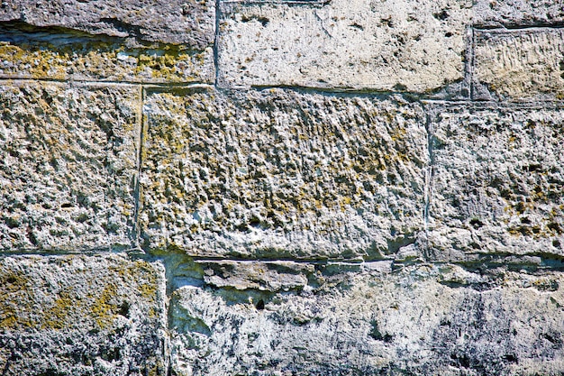 Fragmento de uma parede de uma pedra lascada.