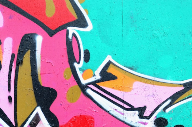 Fragmento de un hermoso patrón de graffiti en rosa y verde con un contorno negro. Fondo de arte callejero