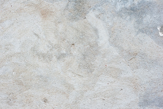 Fragmento de pared con arañazos y grietas