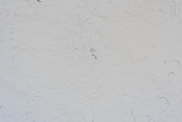 Foto fragmento de pared con rasguños y grietas.