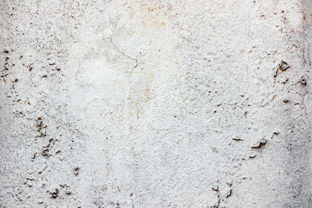 Foto fragmento de pared con rasguños y grietas.