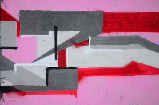 Foto fragmento de pinturas de graffiti de arte callejero de colores con contornos y sombras de cerca