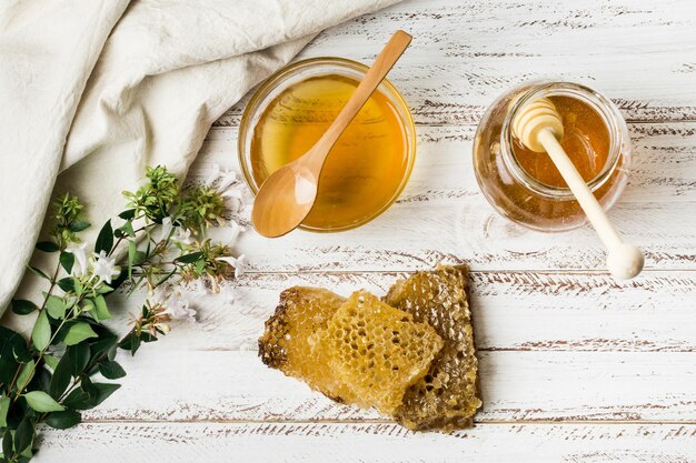 frasco de mel com favo de mel de alta qualidade e resolução belo conceito de foto