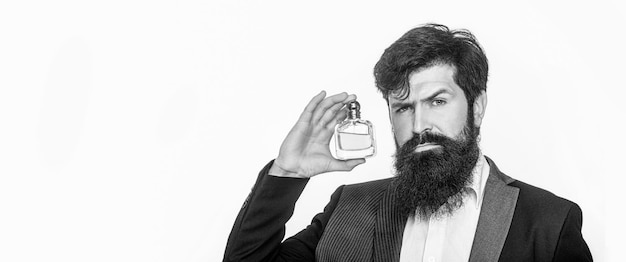 Frasco de perfume ou colônia e perfume de perfume Frasco de colônia masculino segurando colônia Perfume masculino homem barbudo de terno Masculino segurando frasco de perfume Fragrância de perfume masculino Preto e branco