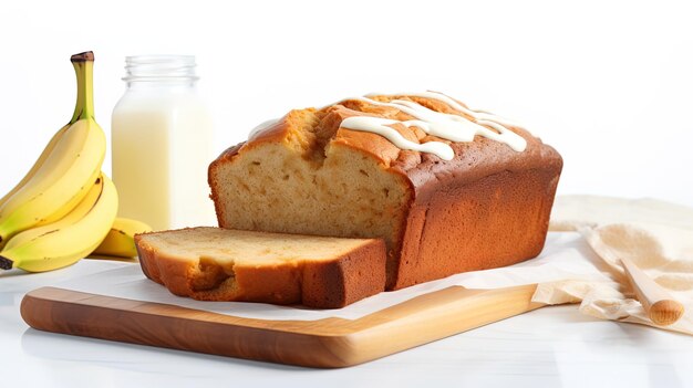 un frasco de vidrio de leche al lado de un pan