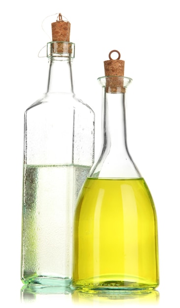 Foto frascos de vidro originais com molho para salada isolado no branco