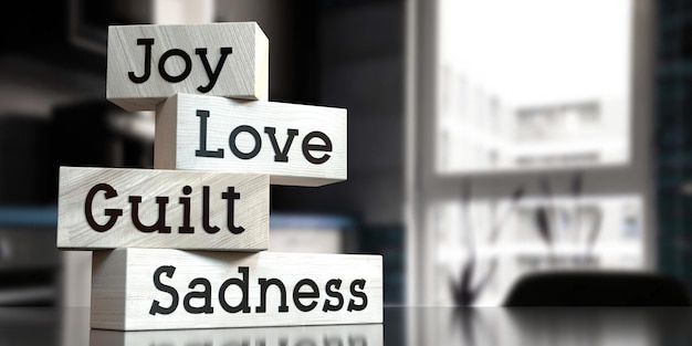 Freude, Liebe, Schuld, Traurigkeit, Worte auf Holzklötzen, 3D-Illustration