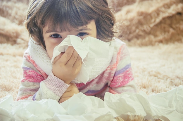 Frío en el niño Goteo nasal Enfoque selectivo Niños