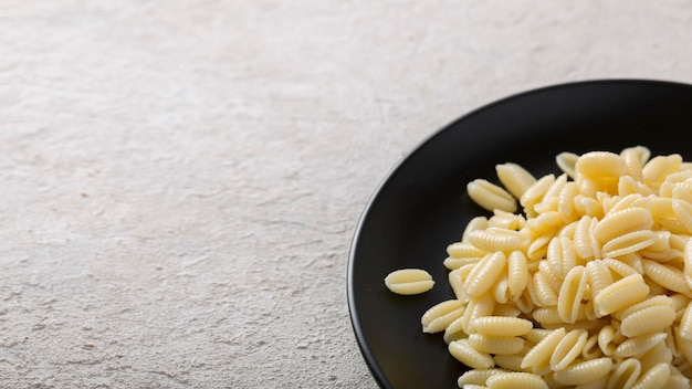 Frisch gekochte vegetarische Gnocchi-Pasta-Nahaufnahme in einer Bratpfanne Italienische Küche