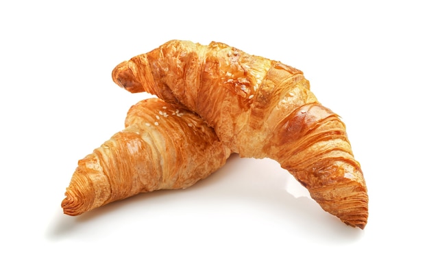 Frisches Buttercroissant lokalisiert auf Weiß.