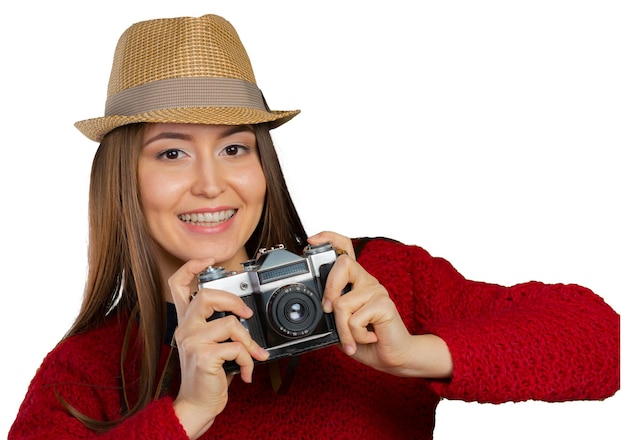 Fröhliche junge Frau mit Kamera